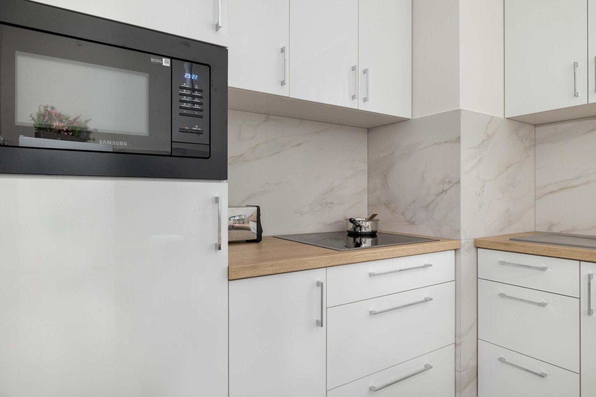 Cozy Apartments Laszkiewicza With Parking By Noclegi Renters Krakow Bagian luar foto