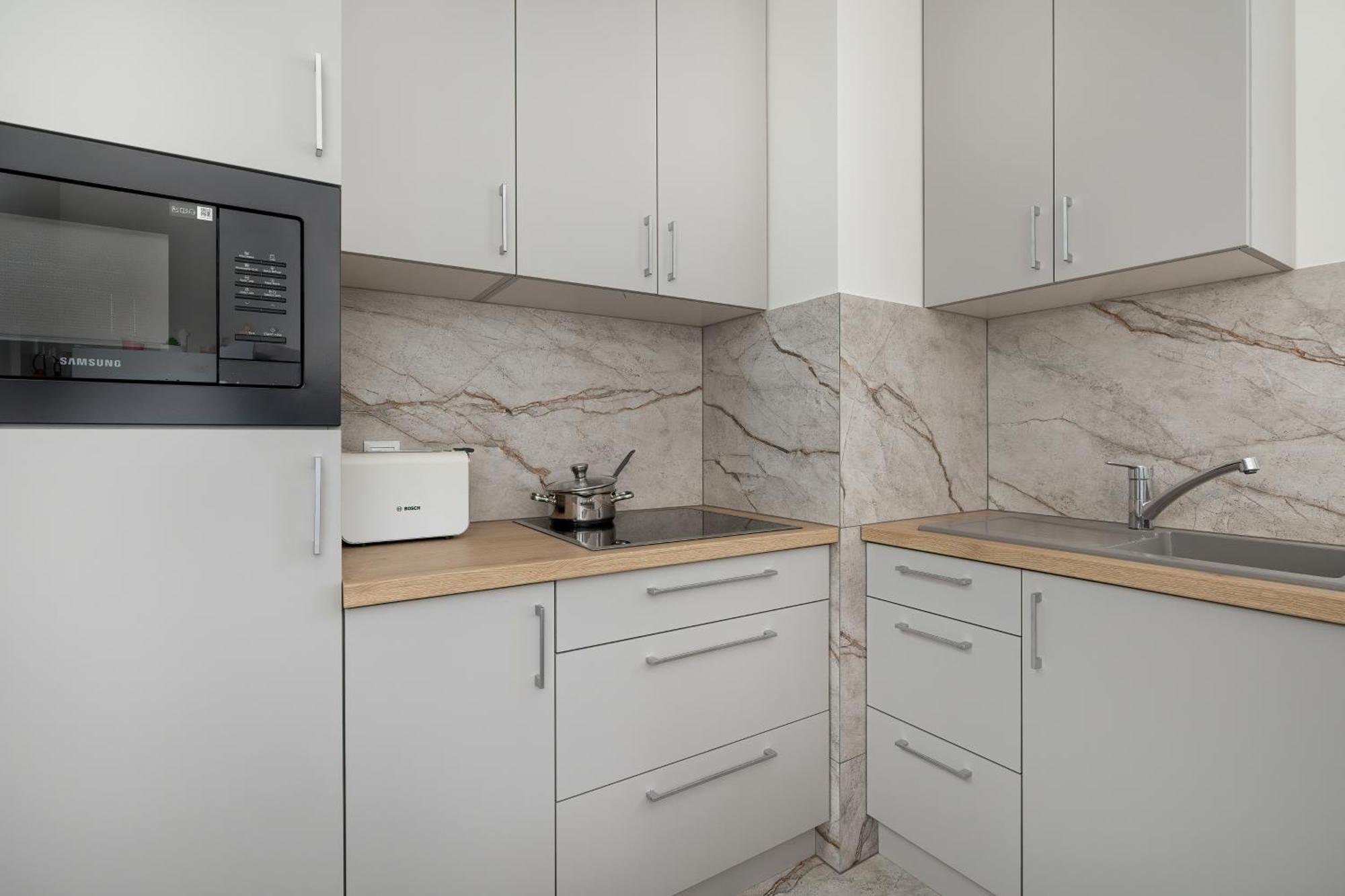 Cozy Apartments Laszkiewicza With Parking By Noclegi Renters Krakow Bagian luar foto