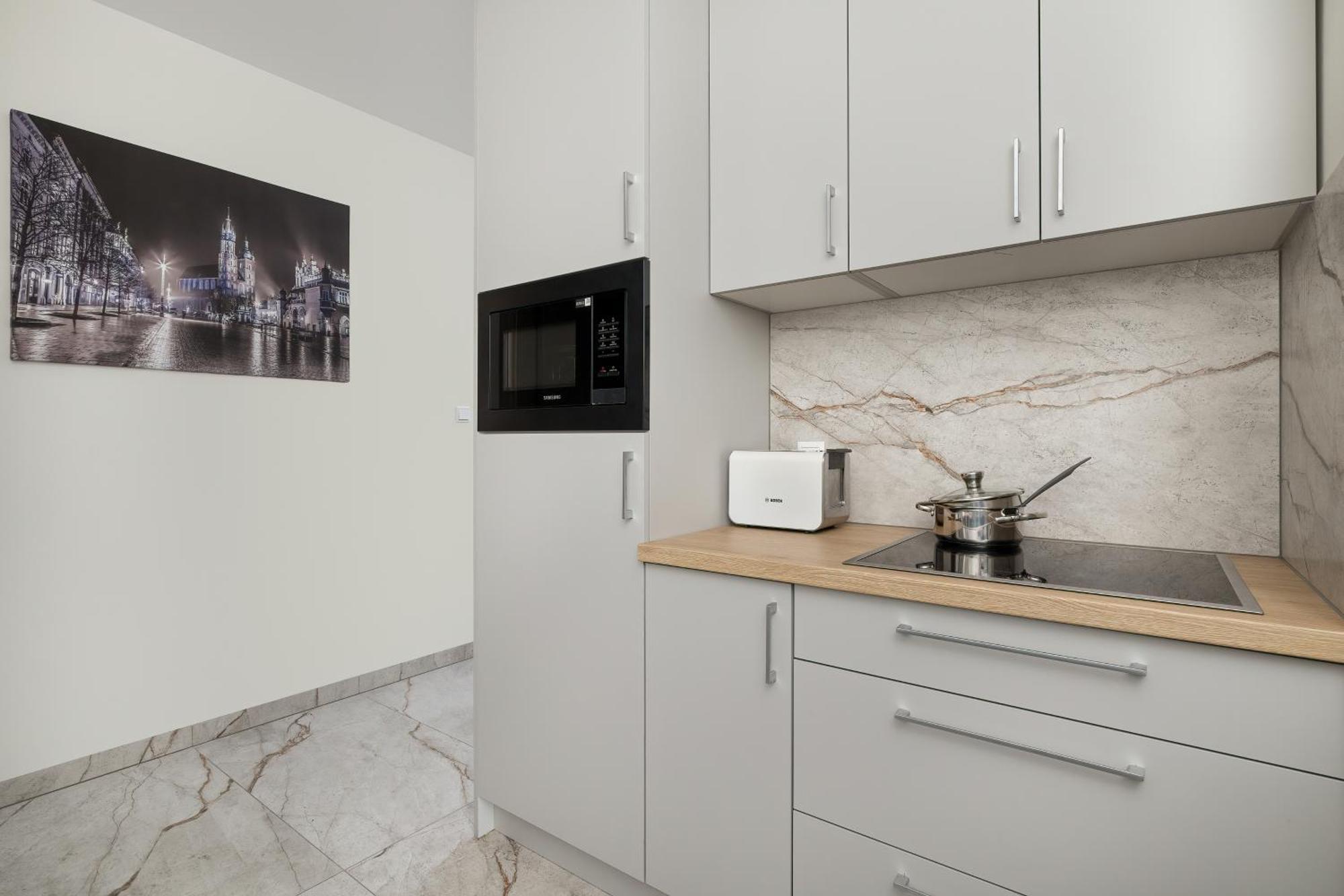 Cozy Apartments Laszkiewicza With Parking By Noclegi Renters Krakow Bagian luar foto
